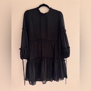 Chic Black Ruffle Mini Dress – Sheer Back Detail
